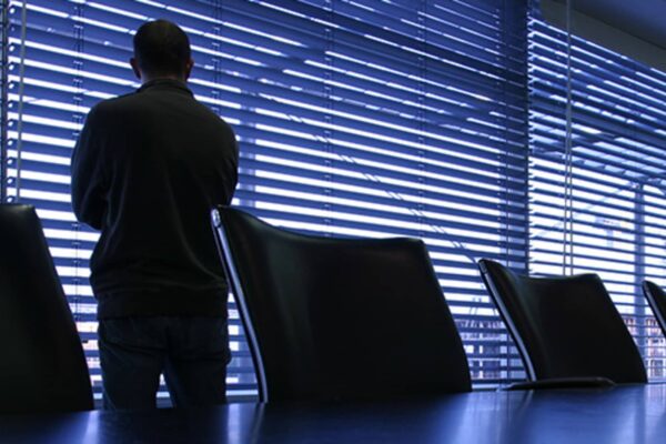 100686514 boardroom man in shadow gettyp