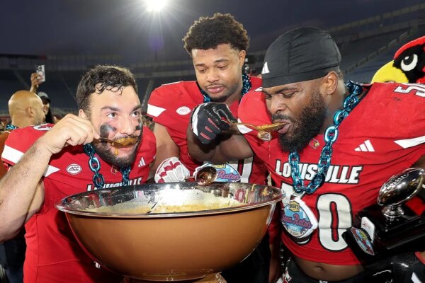 louisville players eat beans after win
