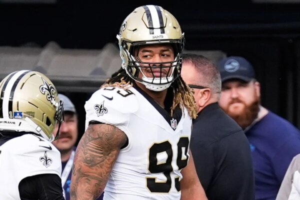 nfl saints chase young 122825 1