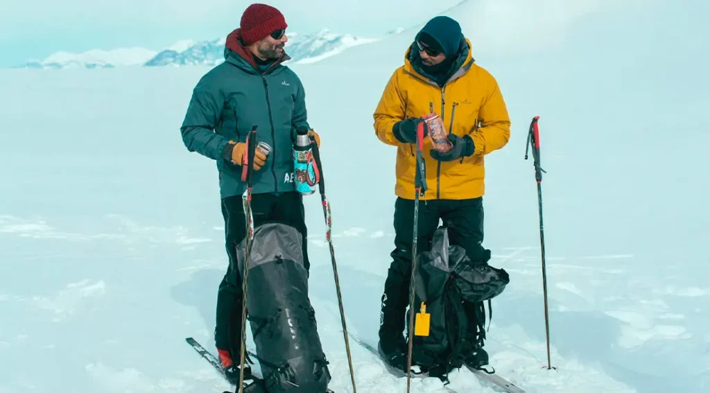 Adventurer and Antartic Guide Richard Parks guiding Will Smith through Antarctica for NatGeo Docuser.webp