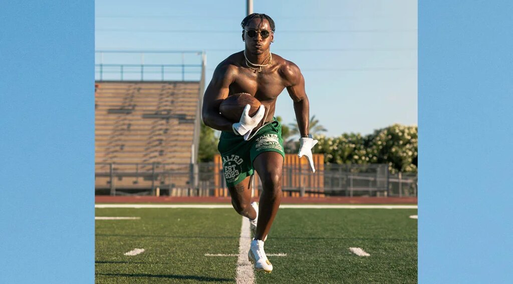 Dee running with the football.jpg