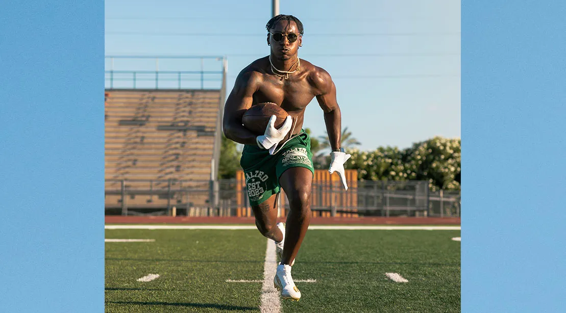 Dee running with the football.jpg