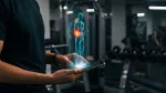 Fitness hologram display Training Weak Points off a tablet in the gym.jpg