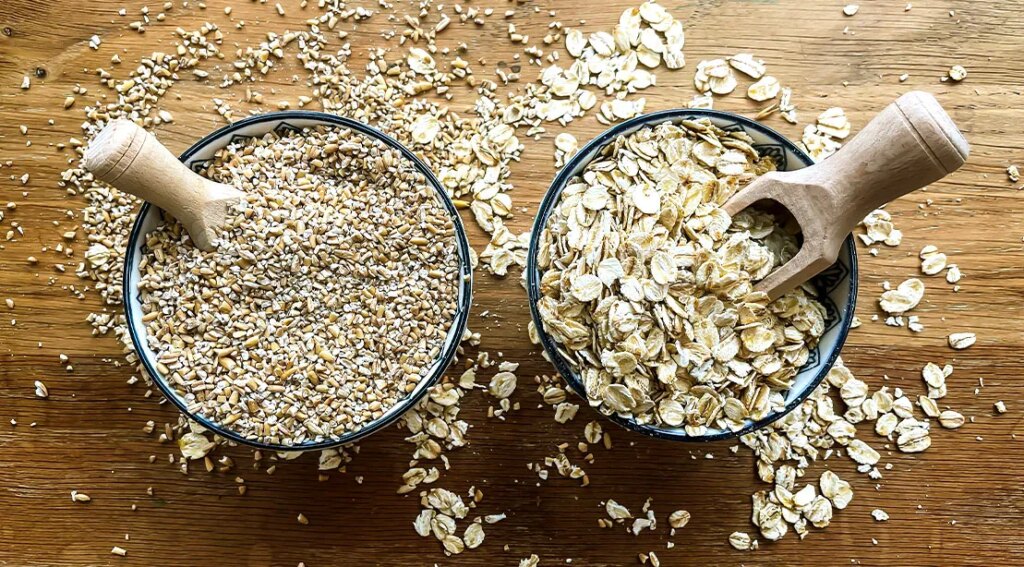 Two different types of oatmeal steel cut and rolled oats.jpg