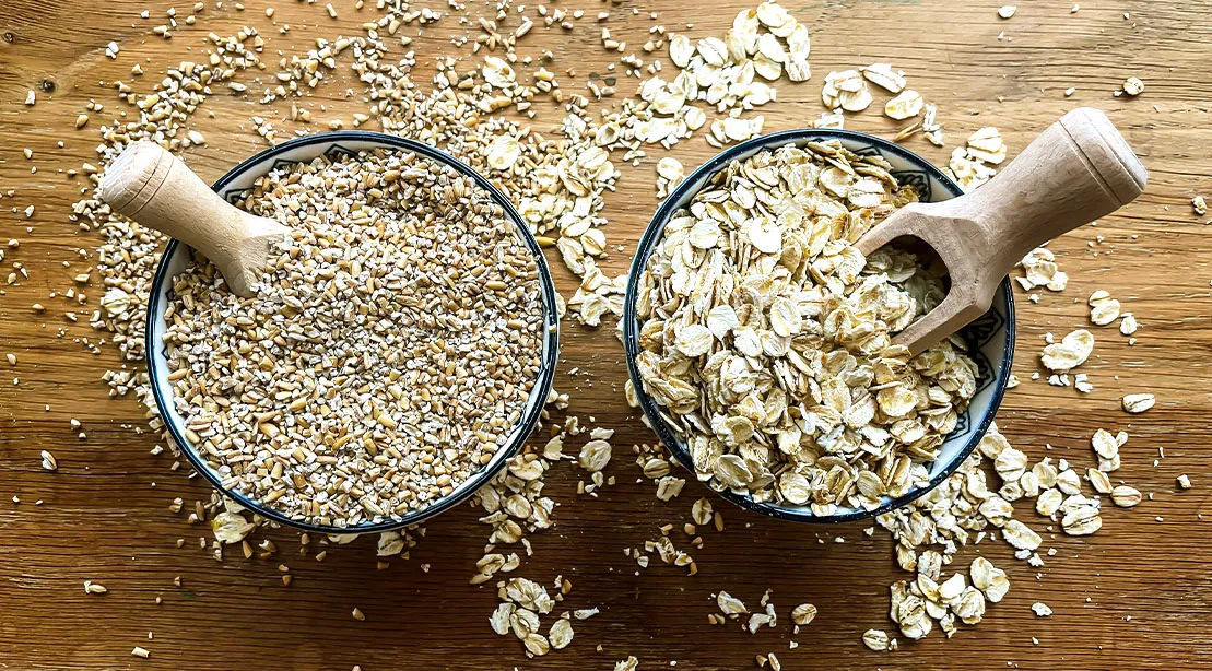 Two different types of oatmeal steel cut and rolled oats.jpg