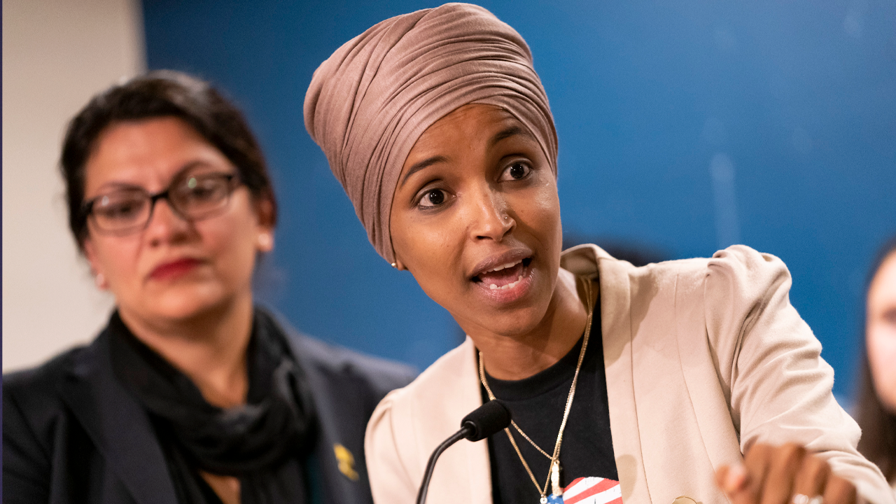 ilhan omar speaks at event.png