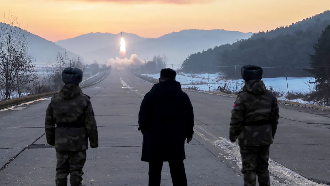 kim jong un watches missiles test.jpg