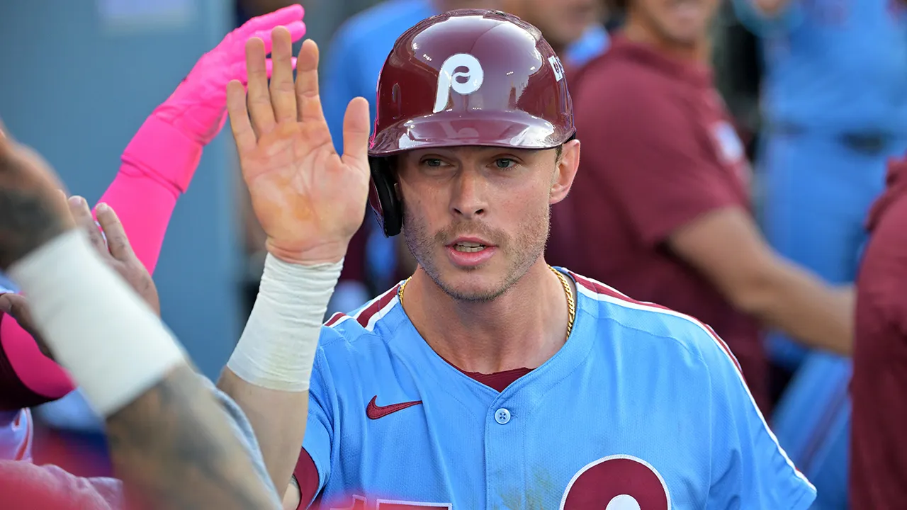 max kepler celebrates phillies dugout.jpg