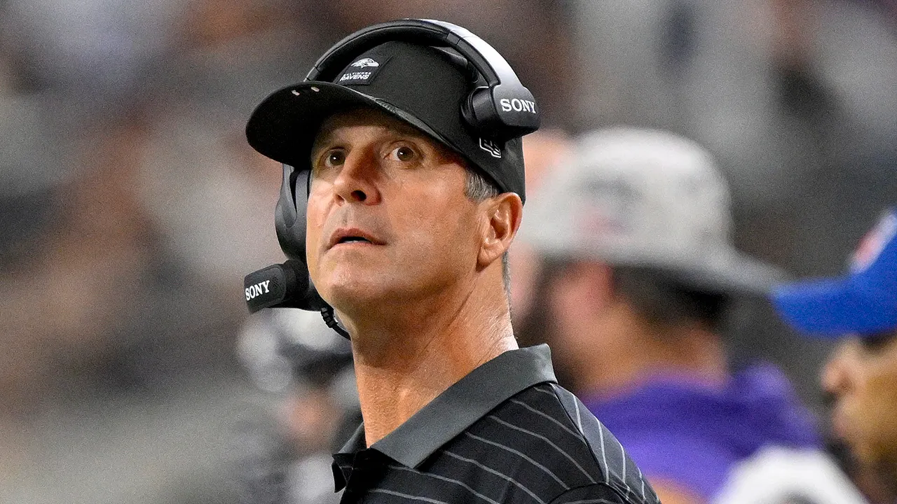 ravens john harbaugh looks on cowboys.jpg