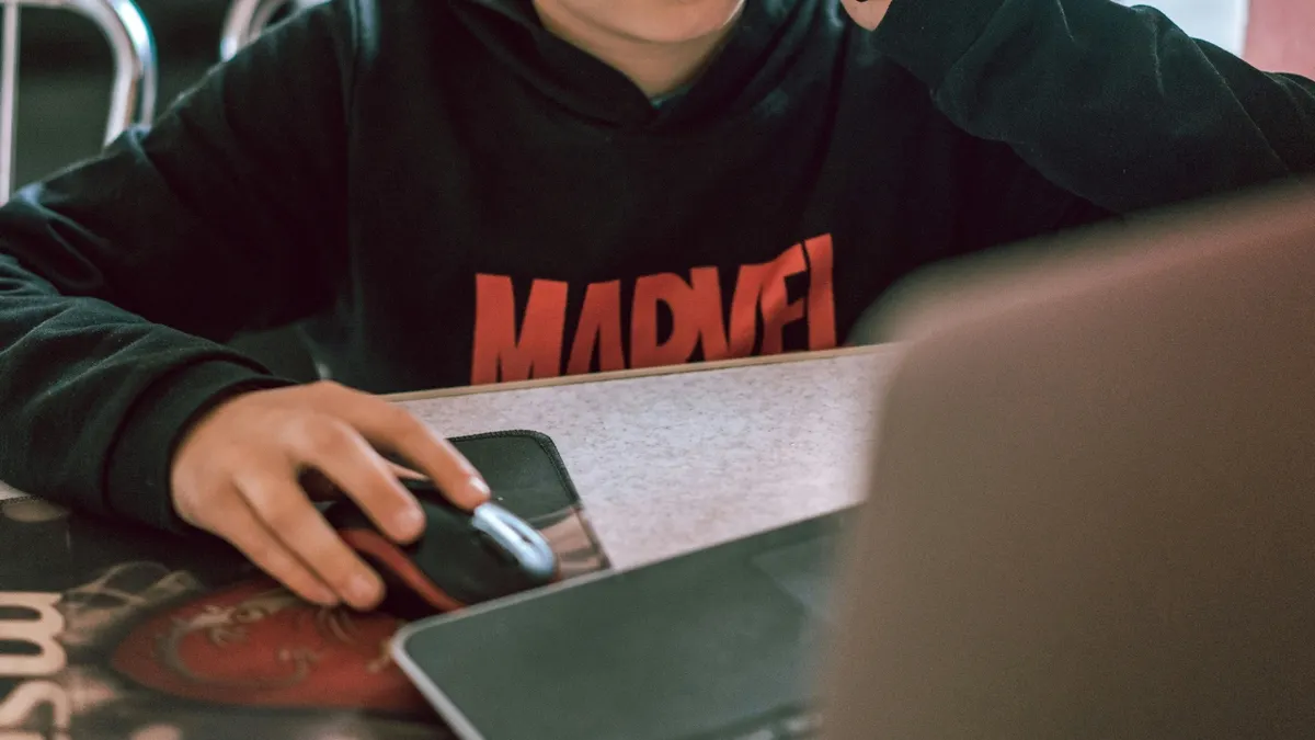 person scrolling computer.jpg