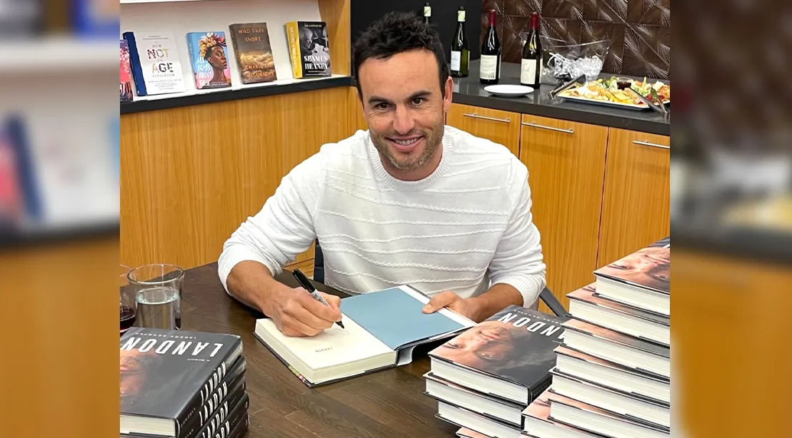 2002 World Cup Soccer Star Landon Donovan signing copies of his book.jpg