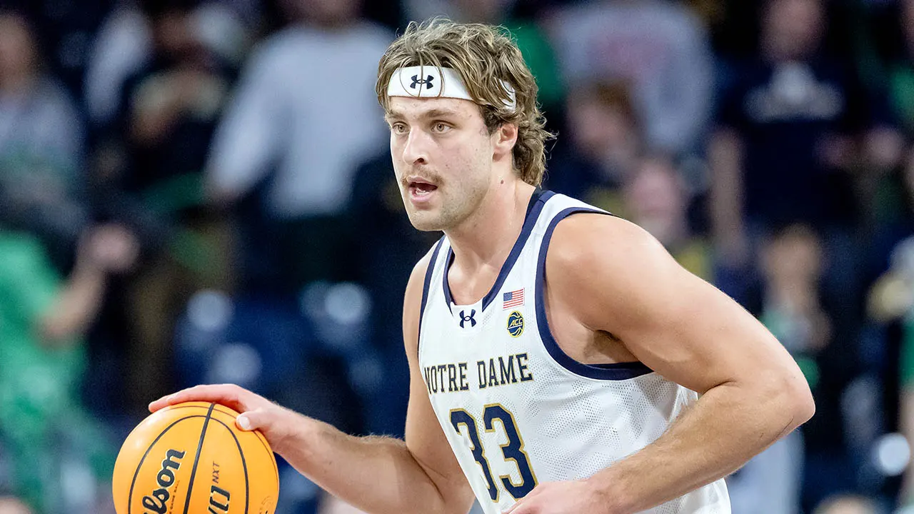 carson towt notre dame dribbles basketball.jpg