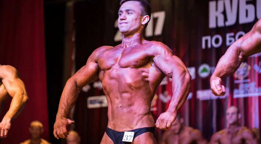 Amateur bodybuilding at a bodybuilding competition earning his ifbb card.jpg