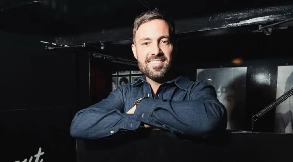 Comedian Jeff Dye outside a comedy club.jpg