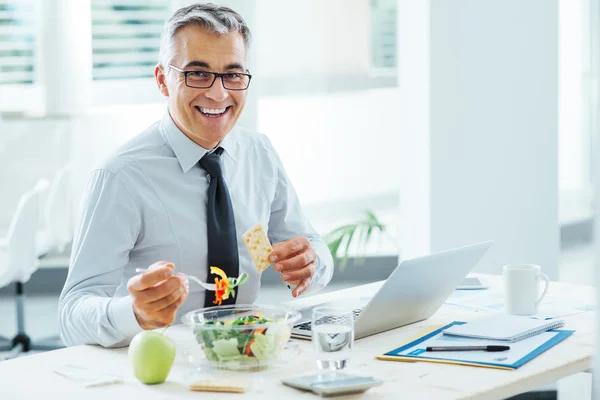 depositphotos 88026184 stock photo smiling businessman having a lunch.webp.webp