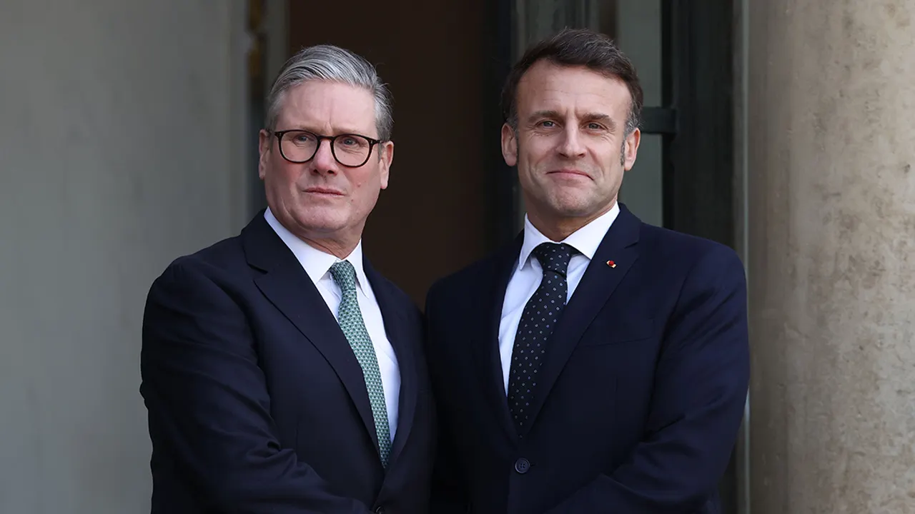 macron welcomes starmer france uk meeting.jpg