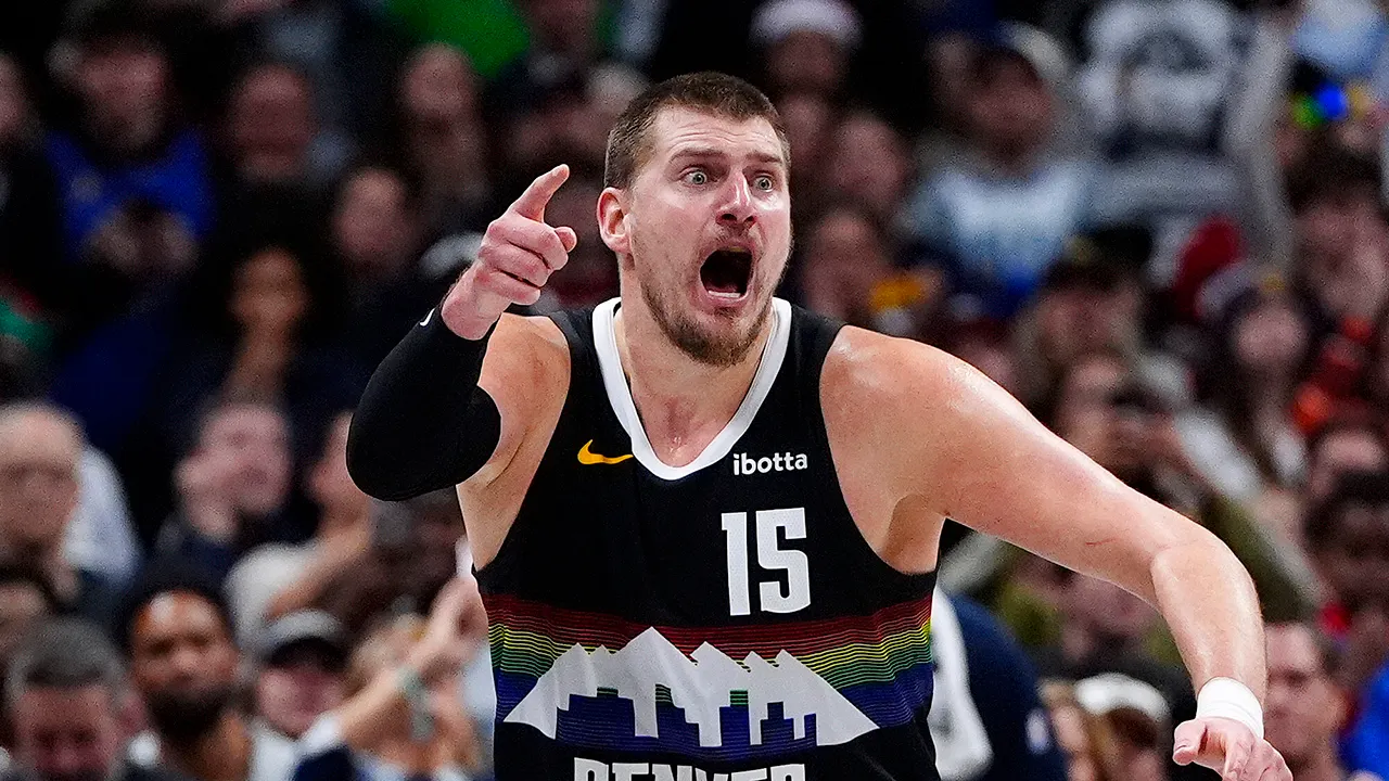 nikola jokic yells out nuggets timberwolves.jpg