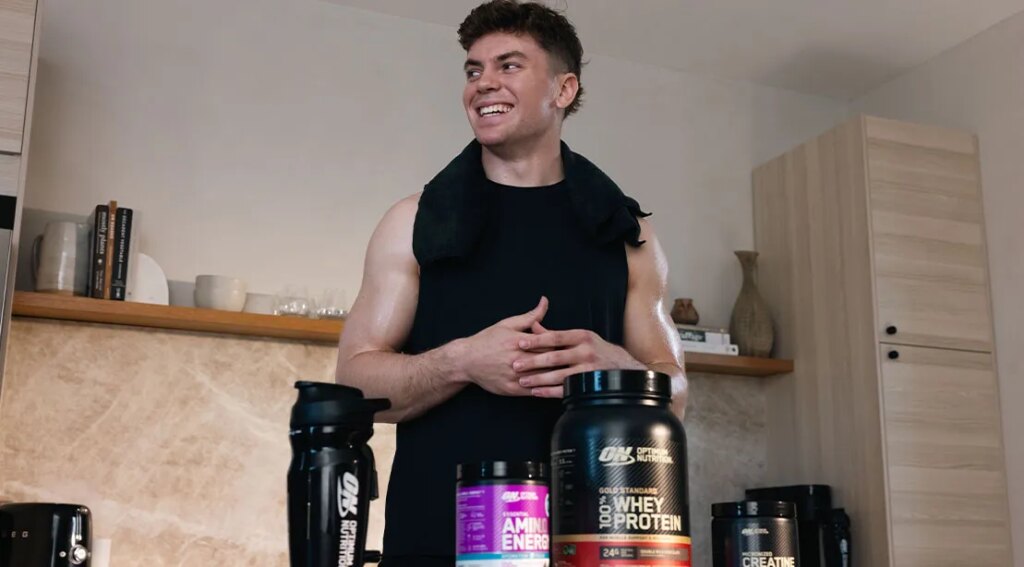 Cooper Dejean at home taking his supplements.jpg