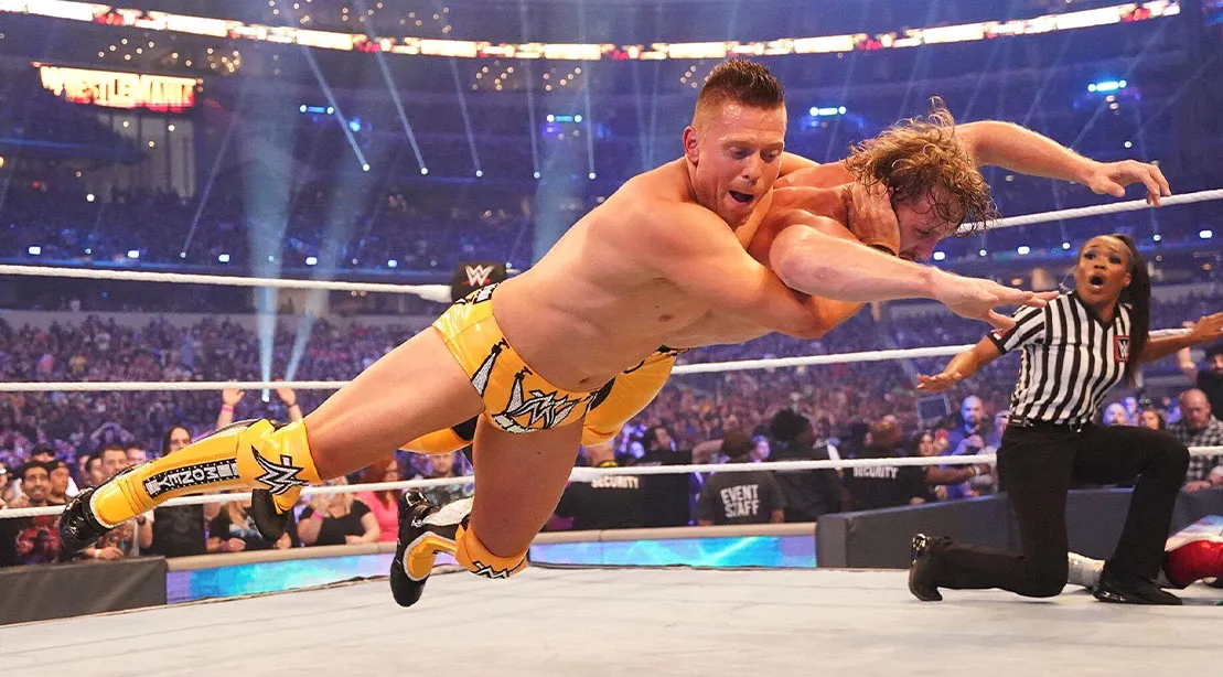 WWE Wrestler The Miz performing a wrestling move on his opponenent in a wrestling match.jpg
