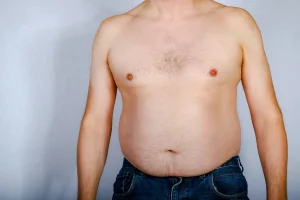 depositphotos 236675624 stock photo overweight shirtless caucasian man standing 300x200.webp.webp