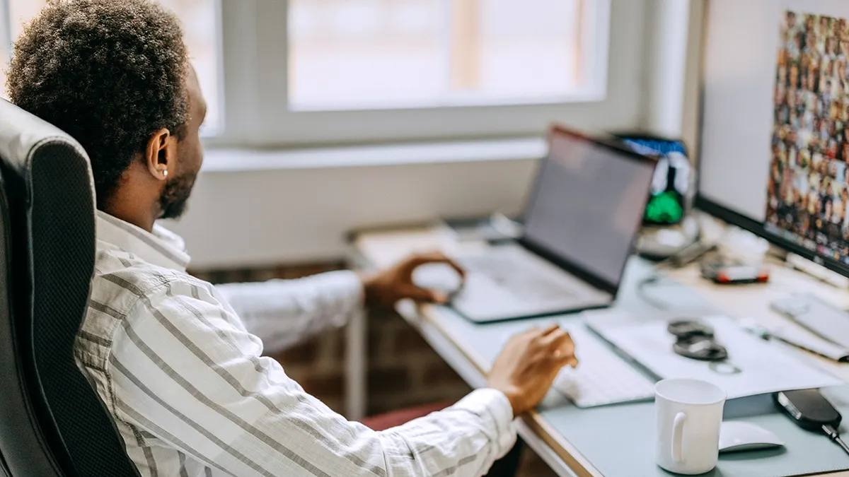 worker on laptop computer.jpg